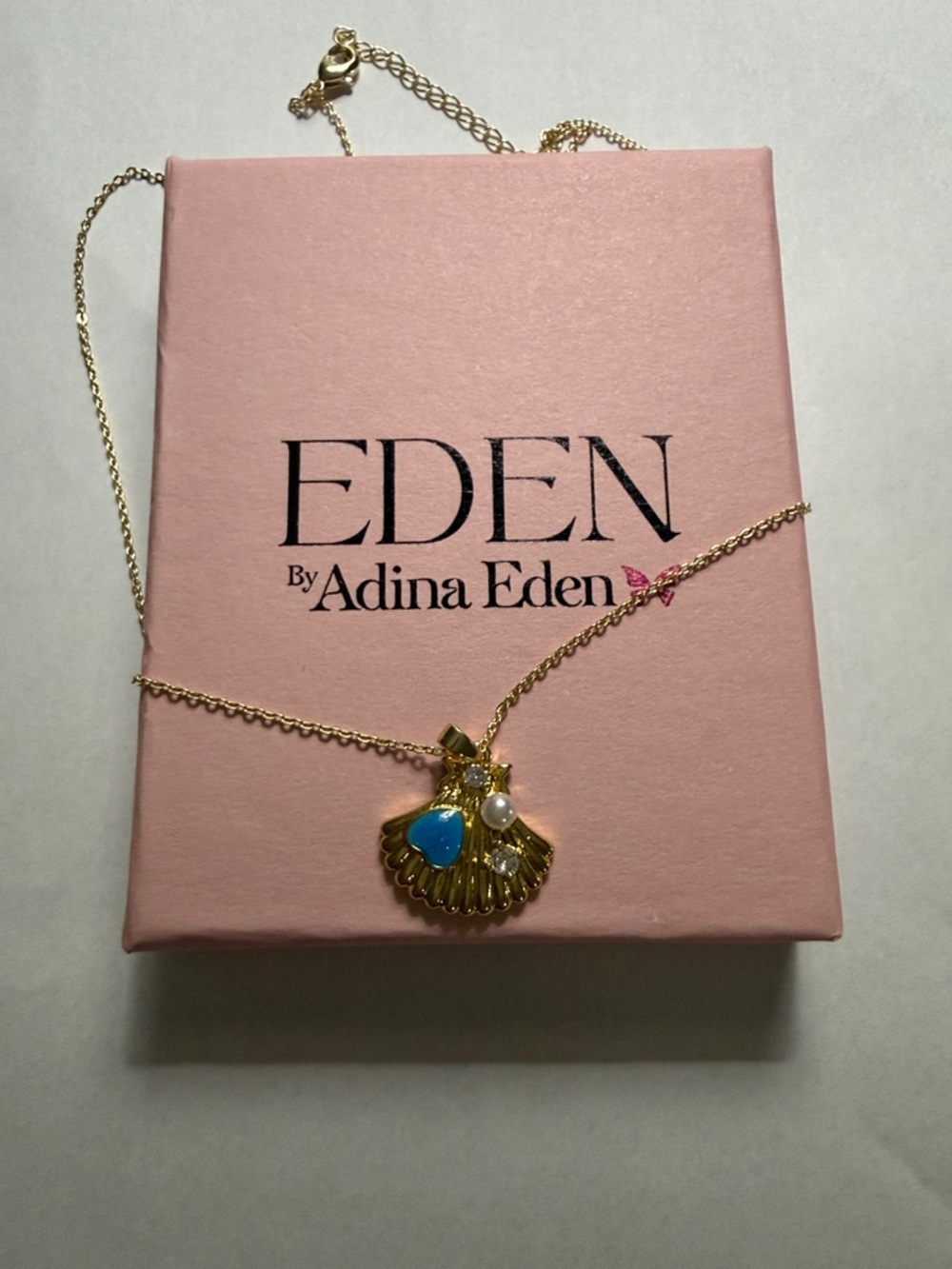 Adina Eden Gold Shell Necklace with Blue Accent and Pearl